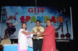 1st Topper (BscIT-1) Award to Ms.Kavita Pradhan by Dr. Dineshanand Goswami with Mr. Om Prakash, Director GIIT